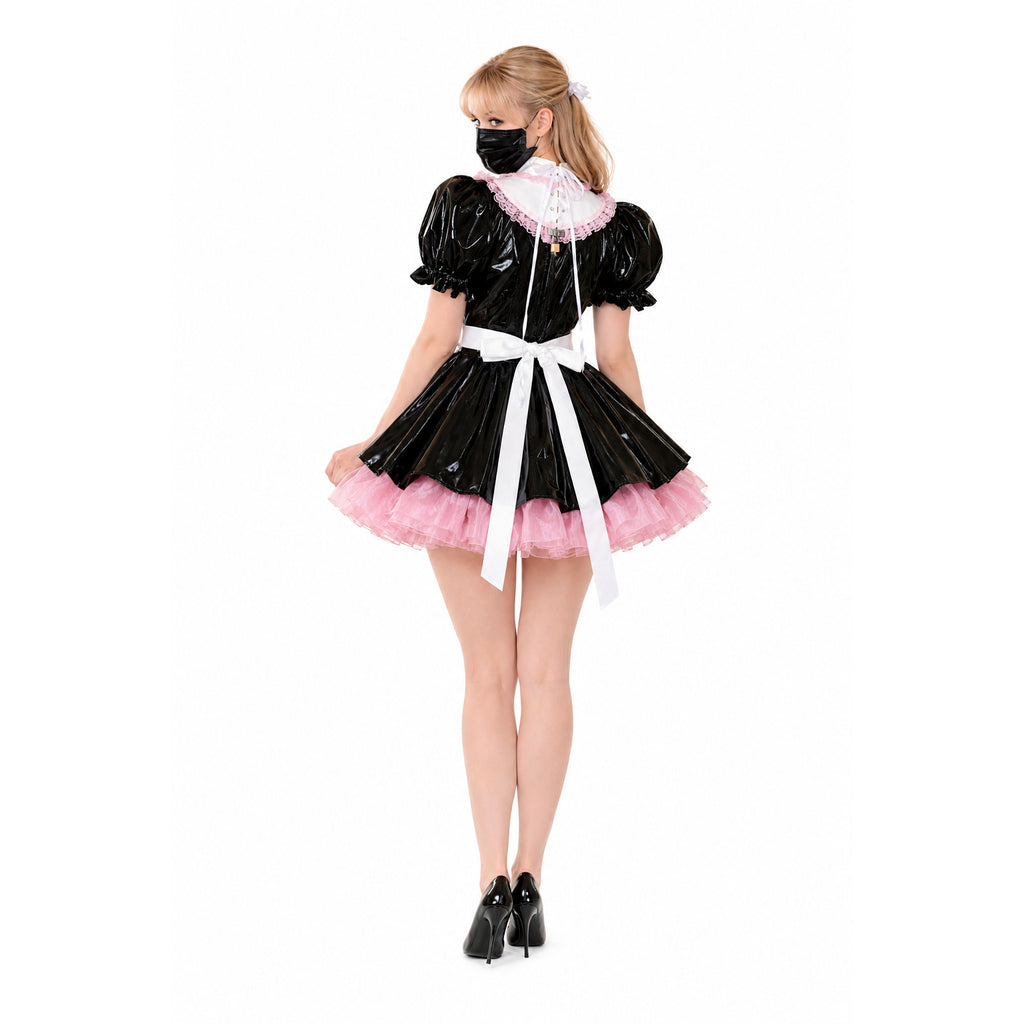 Black PVC sissy maid dress with pink tulle skirt, white bow, and lace collar, worn with heels