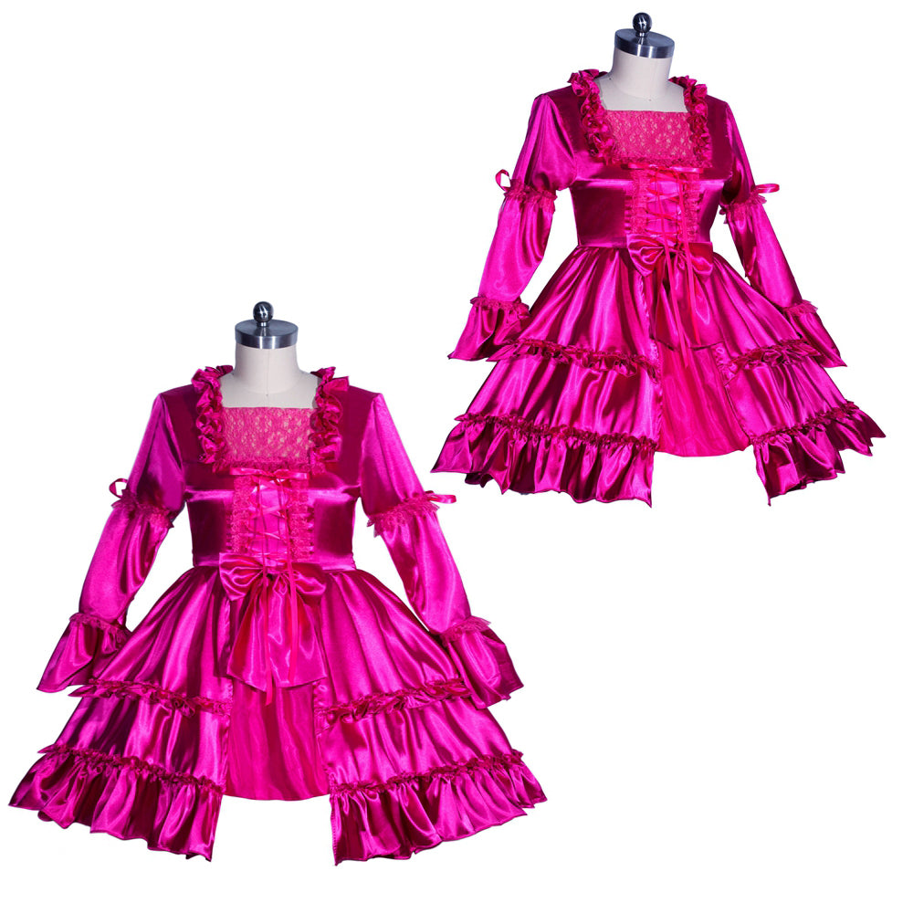 Pink sissy maid dress with ruffles, lace, and bow details on mannequin