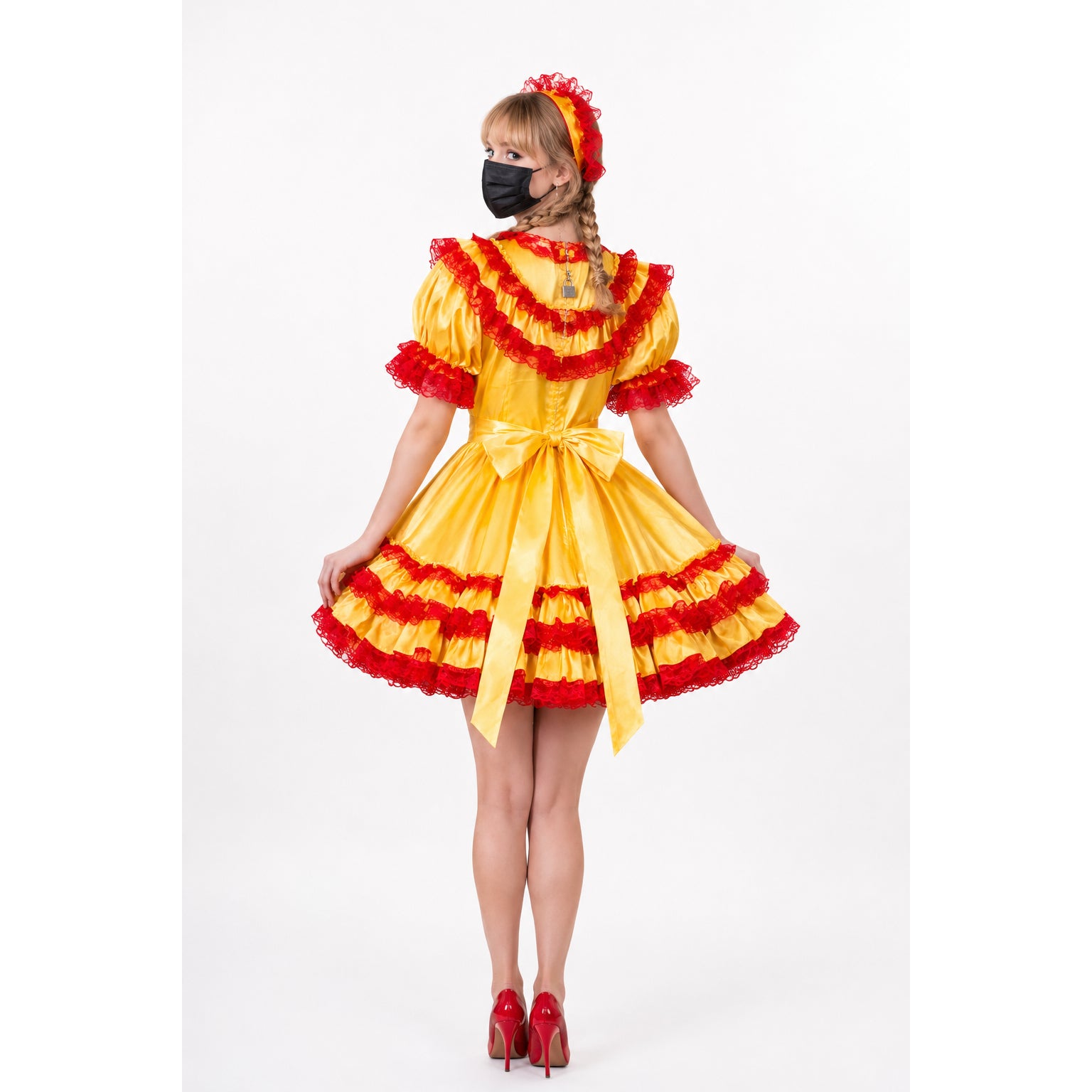 Yellow sissy maid dress with red lace trim, bow waist, and matching headband, styled with red heels.