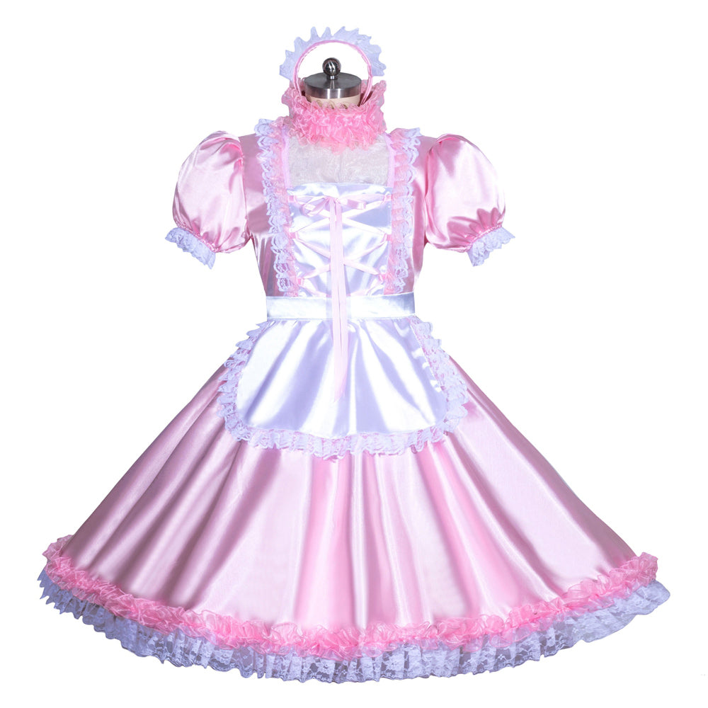 Pink sissy maid dress with lace trim, puffed sleeves, and satin apron on mannequin