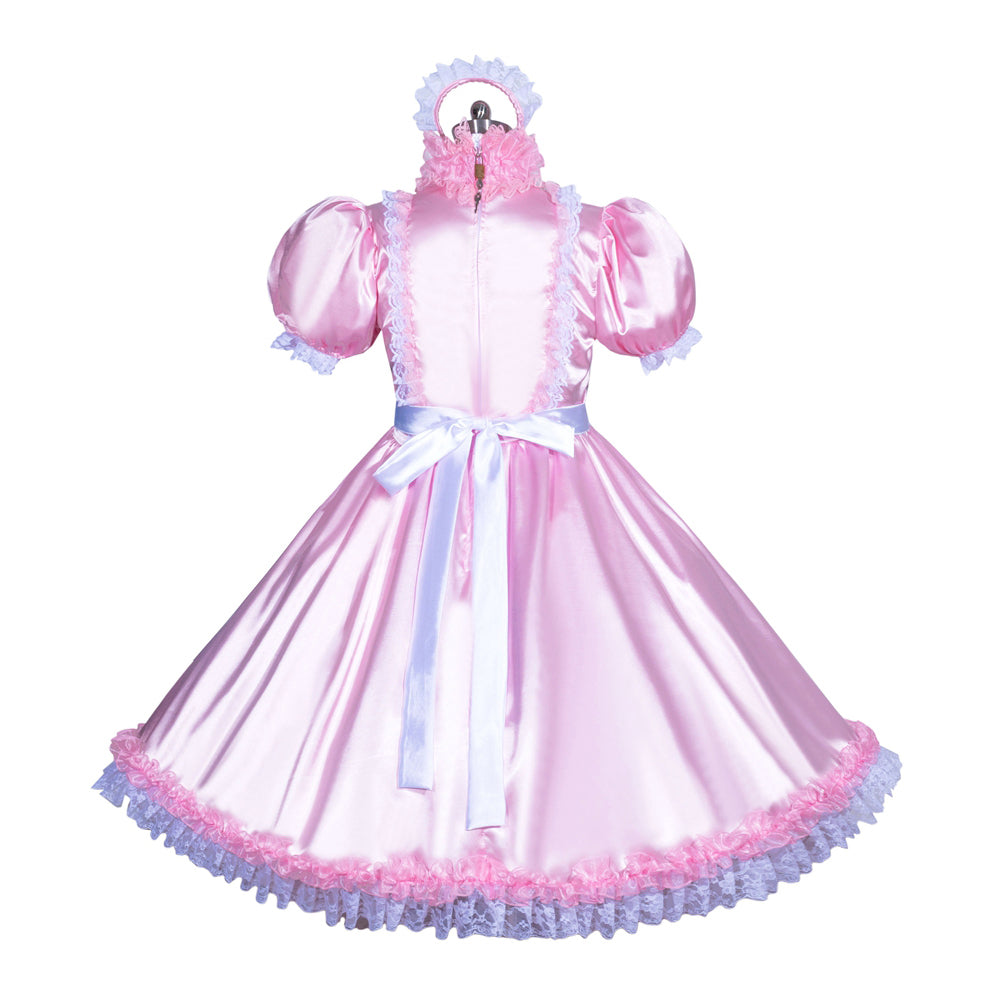 Pink sissy maid dress with ruffles, lace trim, and bow waist, displayed on mannequin