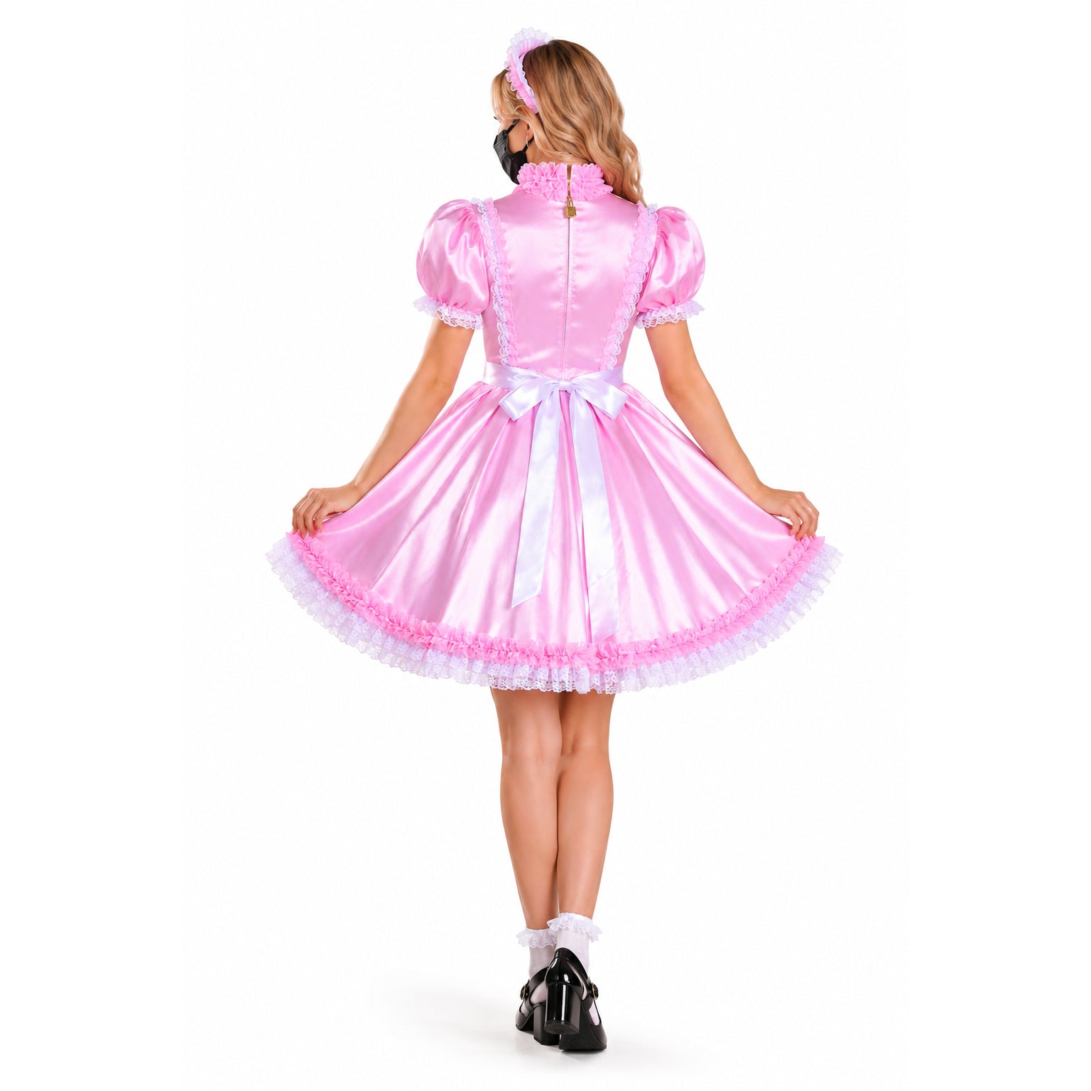 Pink sissy maid dress with lace trim, bow, and matching headband, shown from back