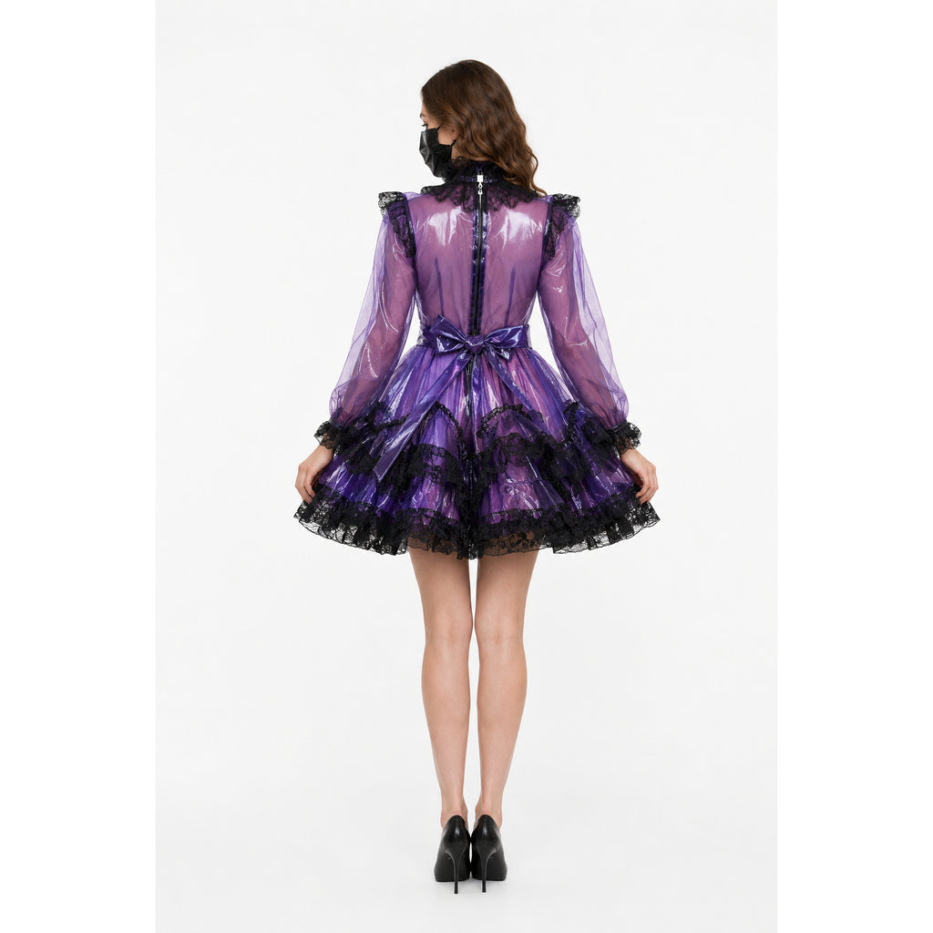 Purple PVC sissy maid dress with black lace trim, bow waist, and sheer sleeves, shown from back