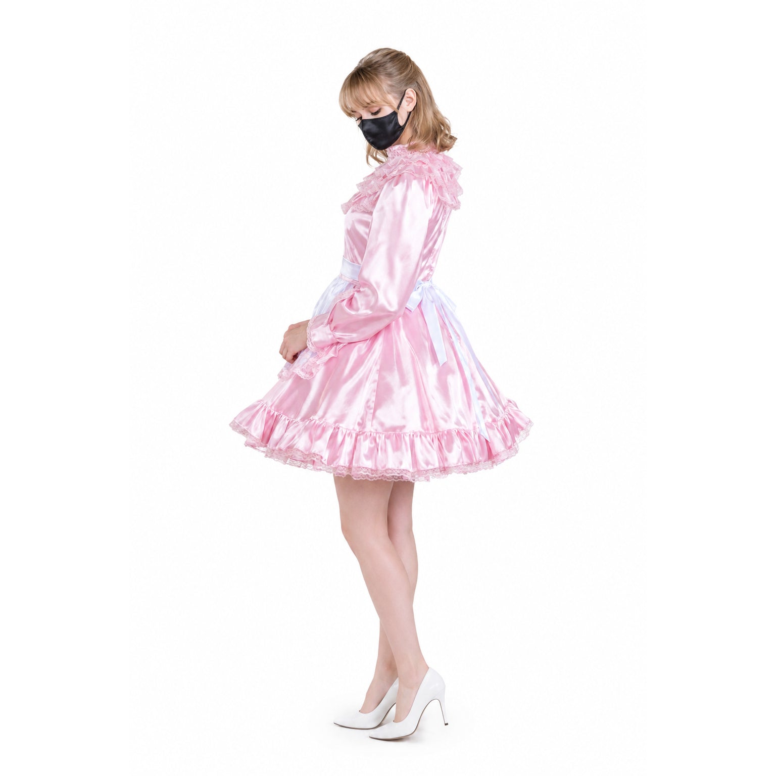 Pink satin sissy maid dress with ruffles, lace trim, and white heels, styled for elegant costume fashion.
