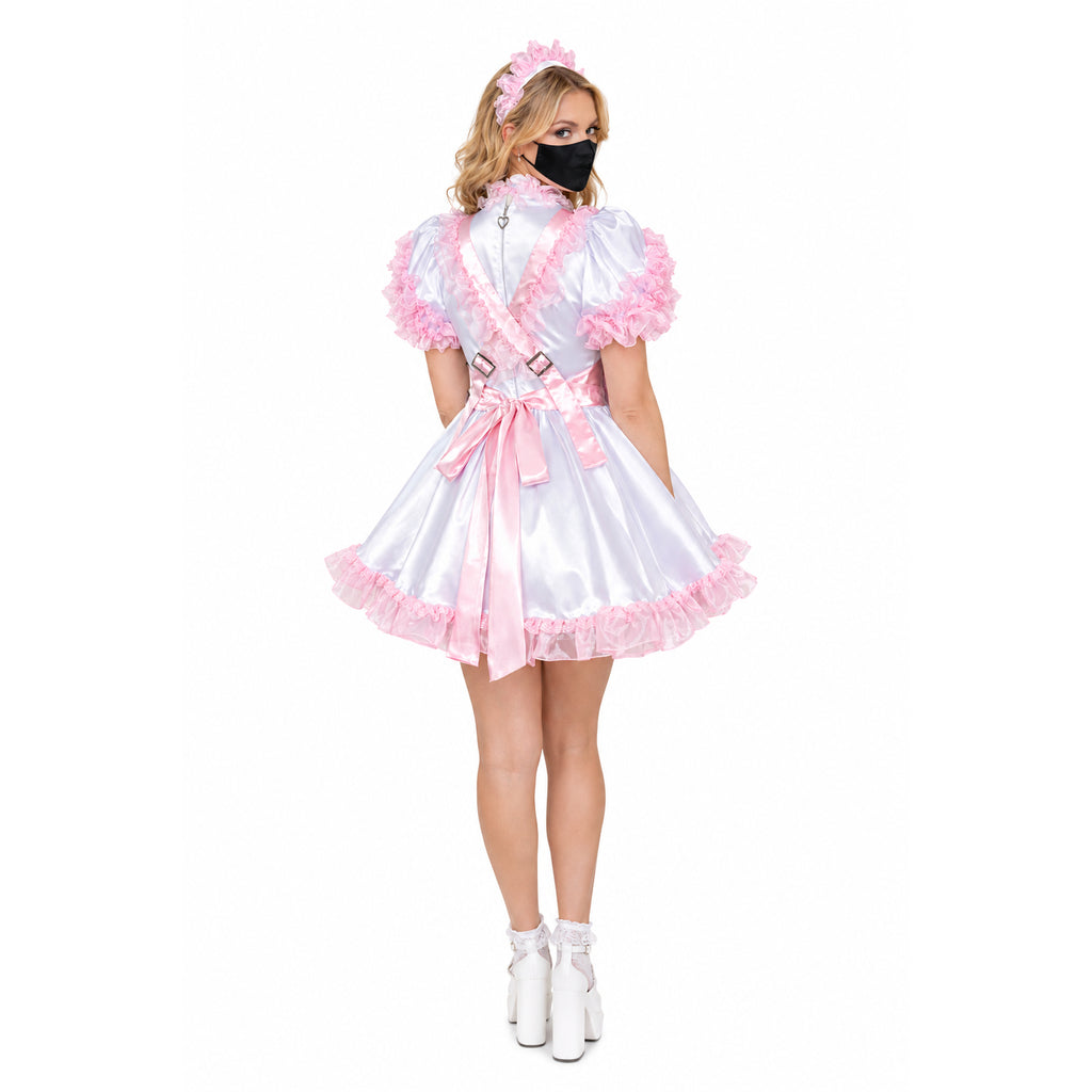 Pink and white sissy maid dress with ruffles, satin bow, and matching headband, shown from back