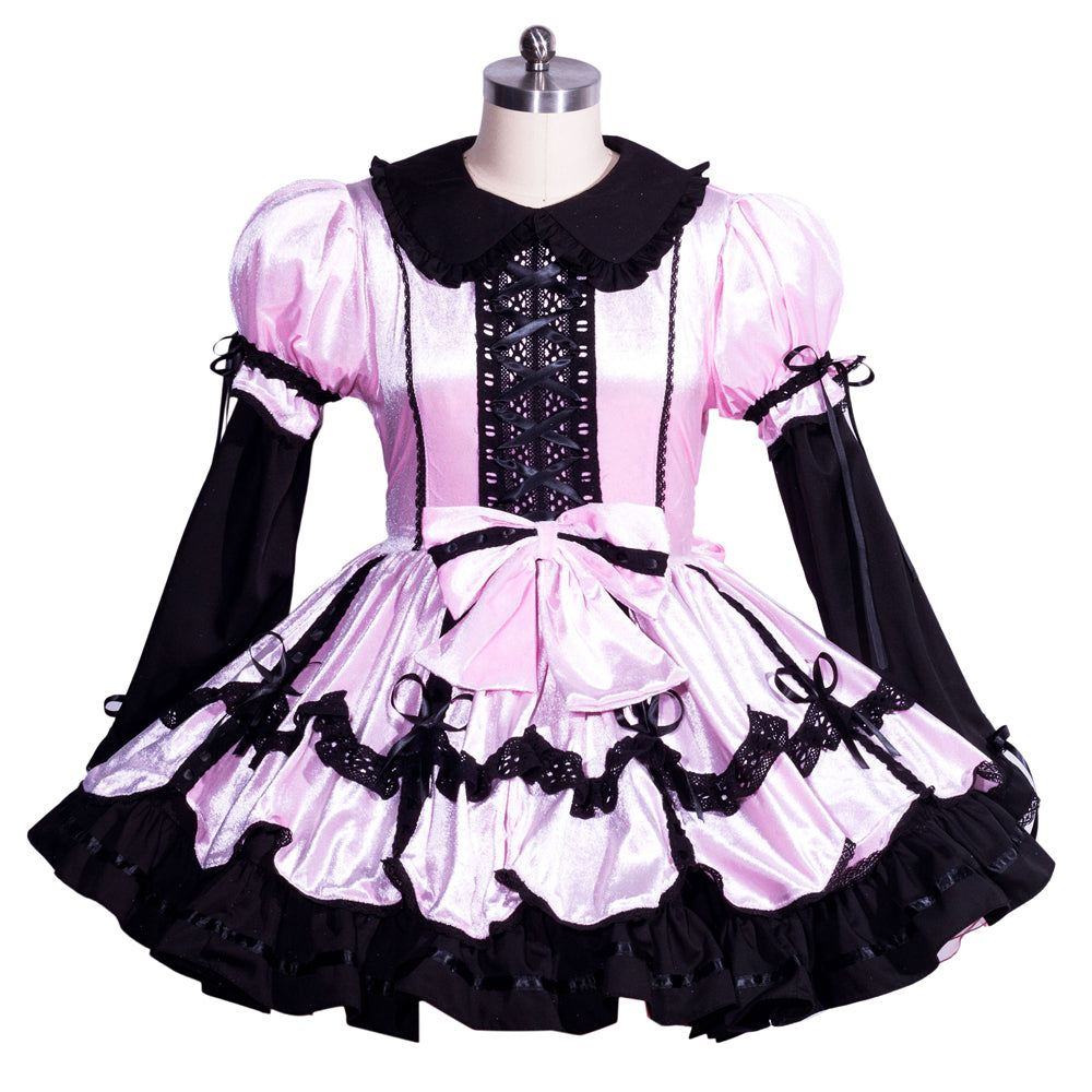 Pink and black sissy maid dress with lace-up front, ruffles, and bow details on mannequin