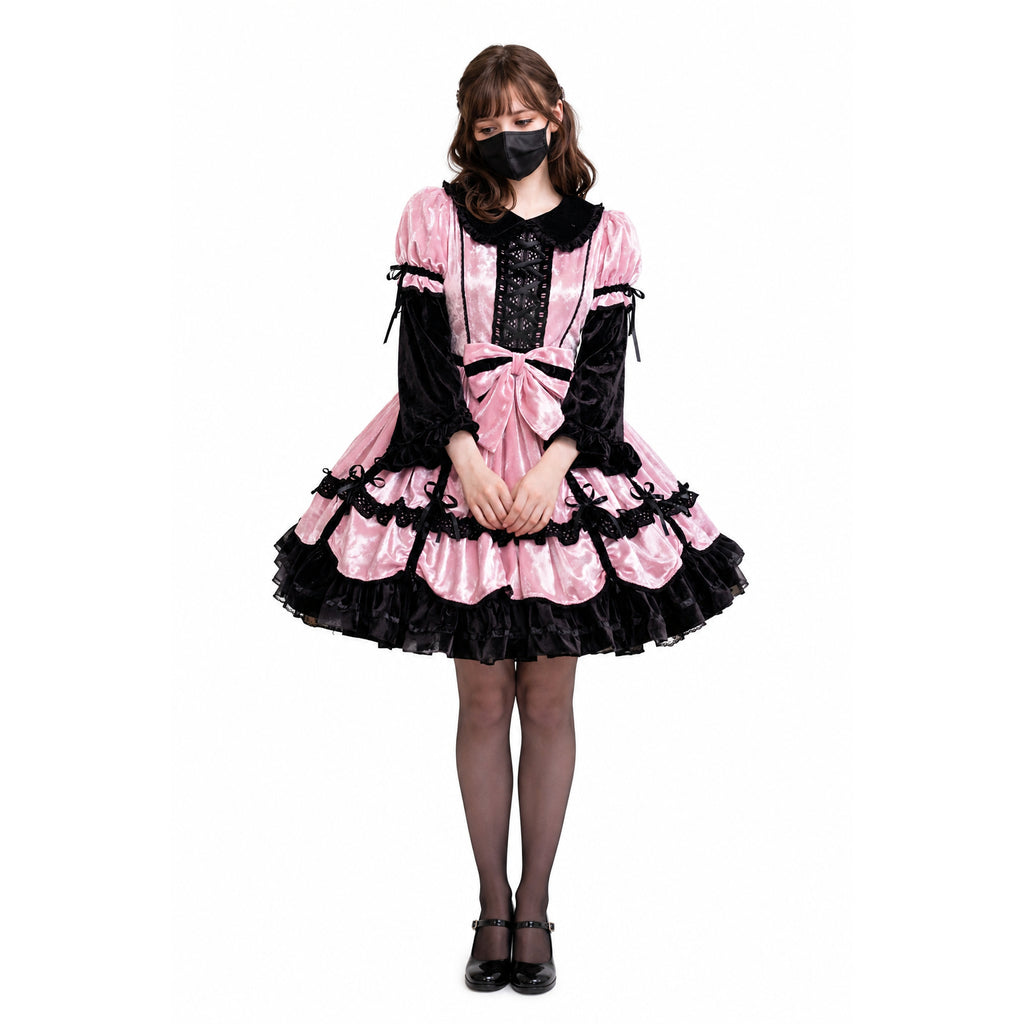 Pink and black sissy maid dress with lace-up corset, ruffles, and bow detail
