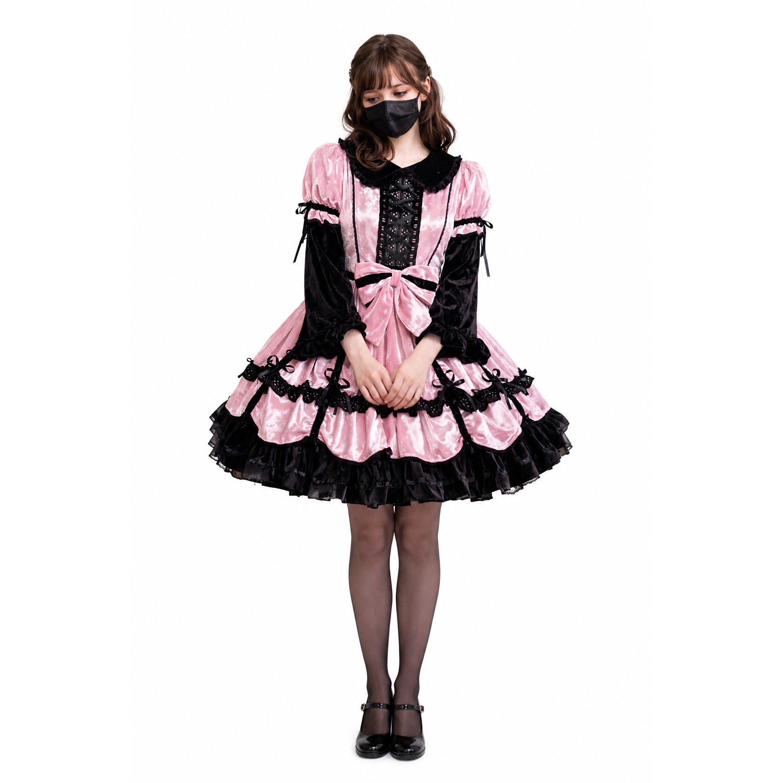Pink and black sissy maid dress with lace-up corset, ruffles, and bow detail
