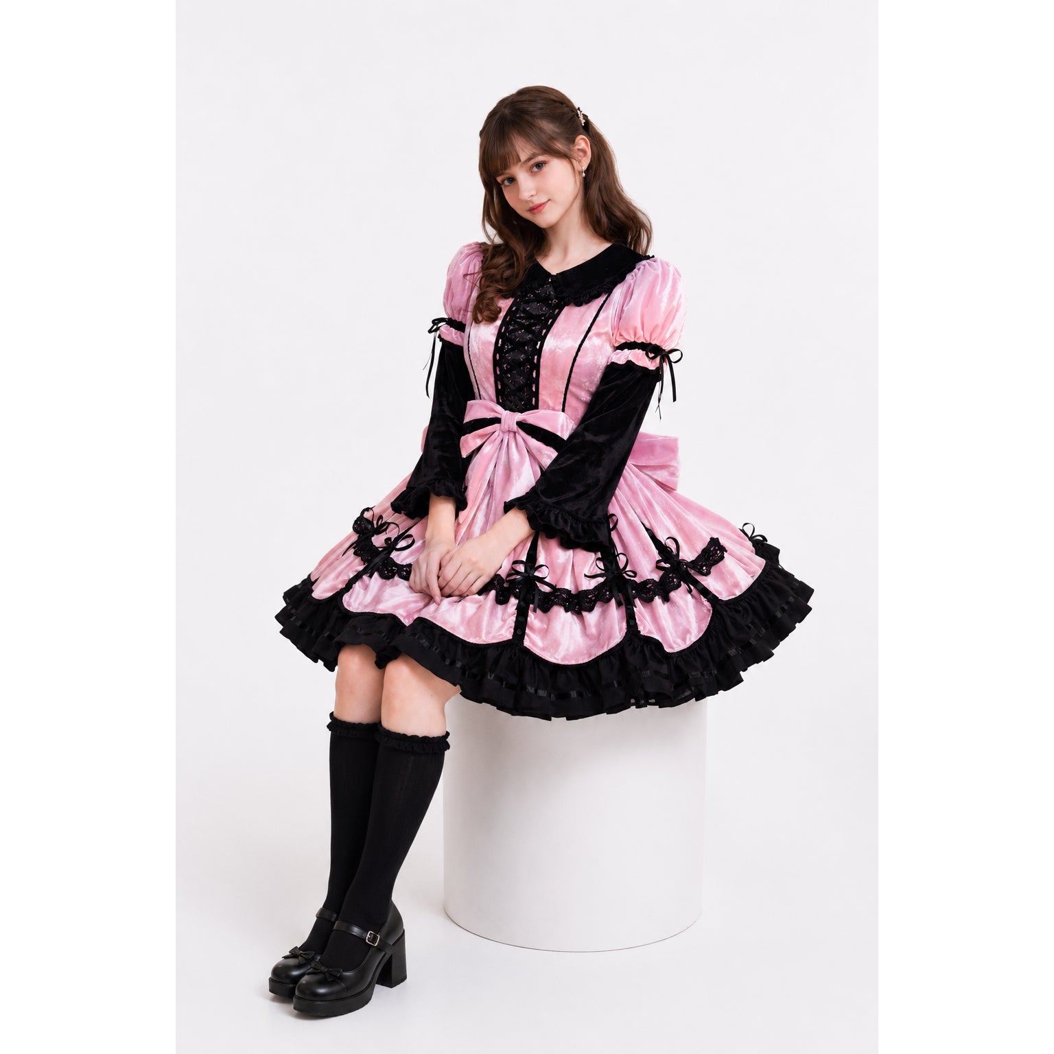 Pink and black sissy maid dress with lace, ruffles, and bow detail, styled with knee-high socks and heels