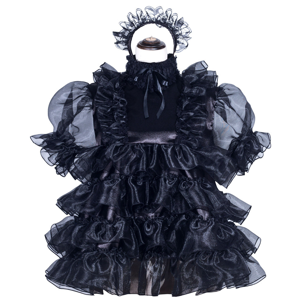 Black sissy maid dress with ruffles, puffy sleeves, and matching headpiece on mannequin