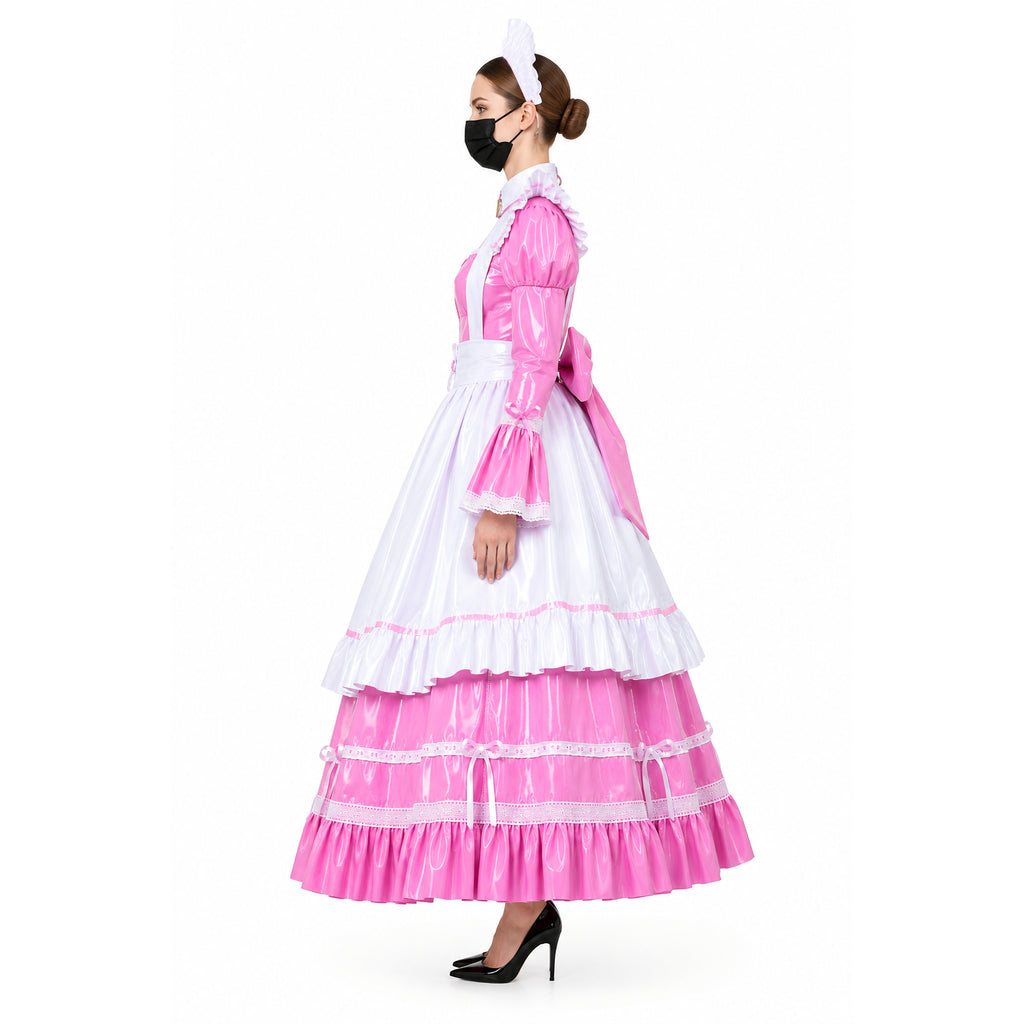 Pink and white sissy maid dress with ruffles, bow, and PVC material, styled with black heels and headpiece