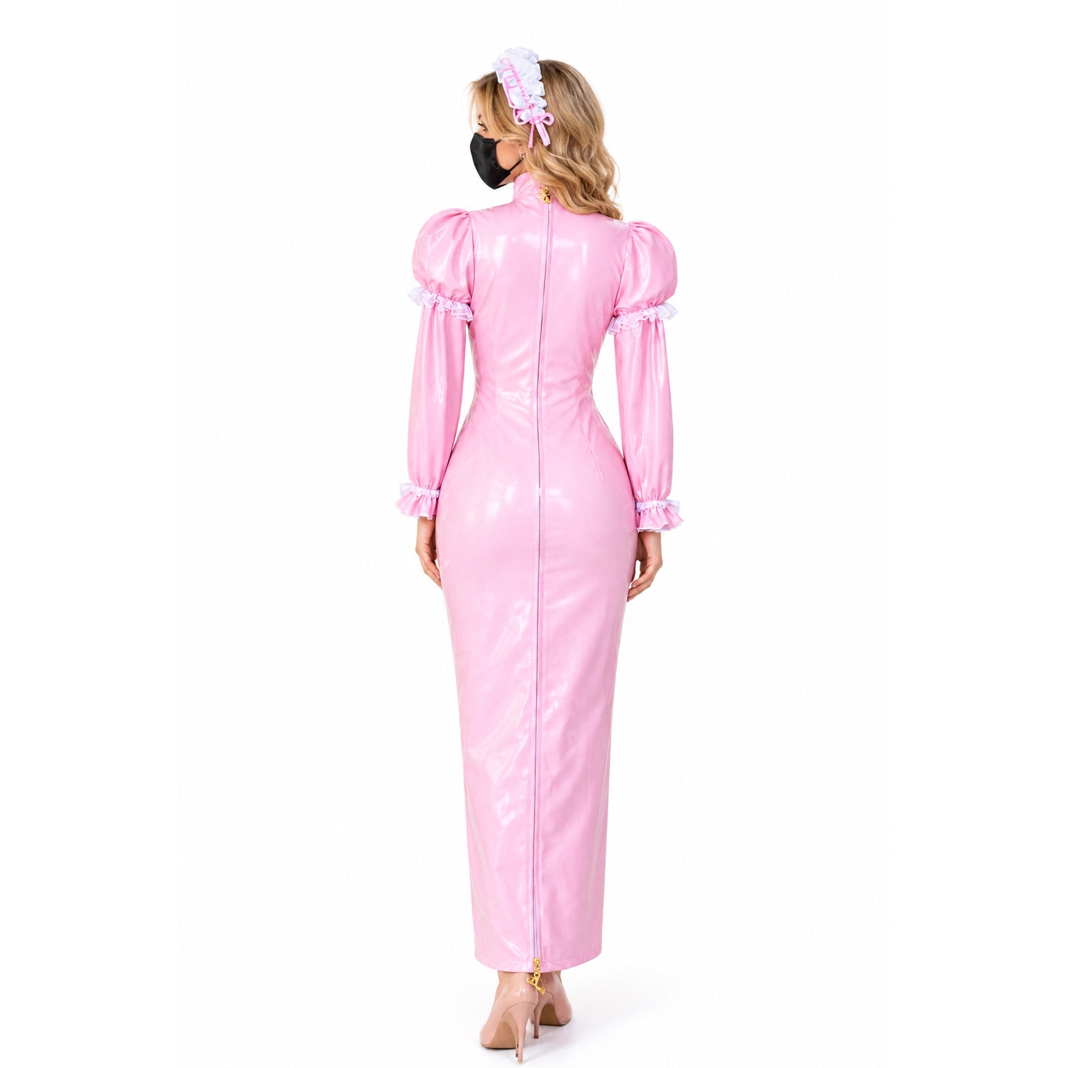 Pink PVC sissy maid dress with ruffled sleeves, back zipper, and matching headband, shown from behind.