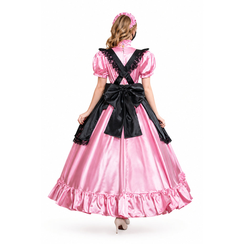 Pink sissy maid dress with black lace apron and bow, back view