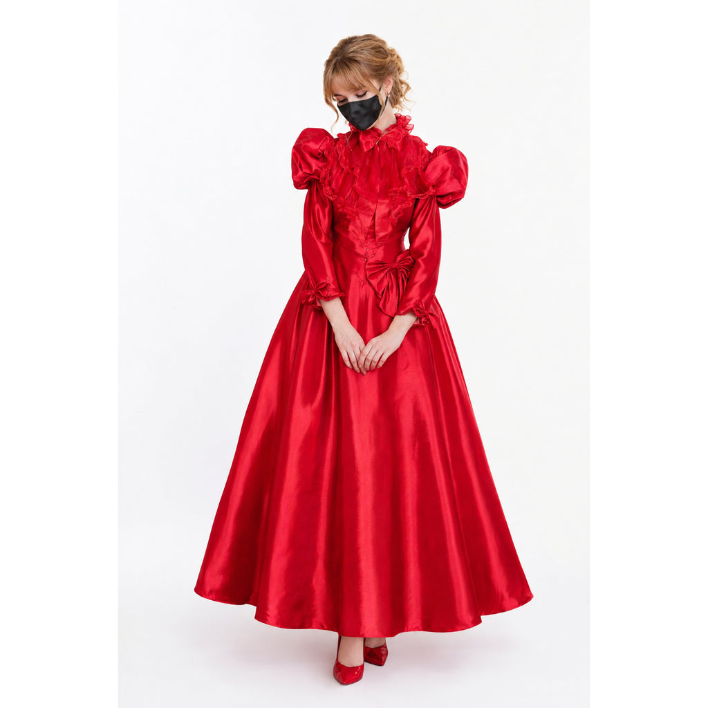 Red sissy maid dress with ruffles, puffed sleeves, and bow detail, worn with matching heels