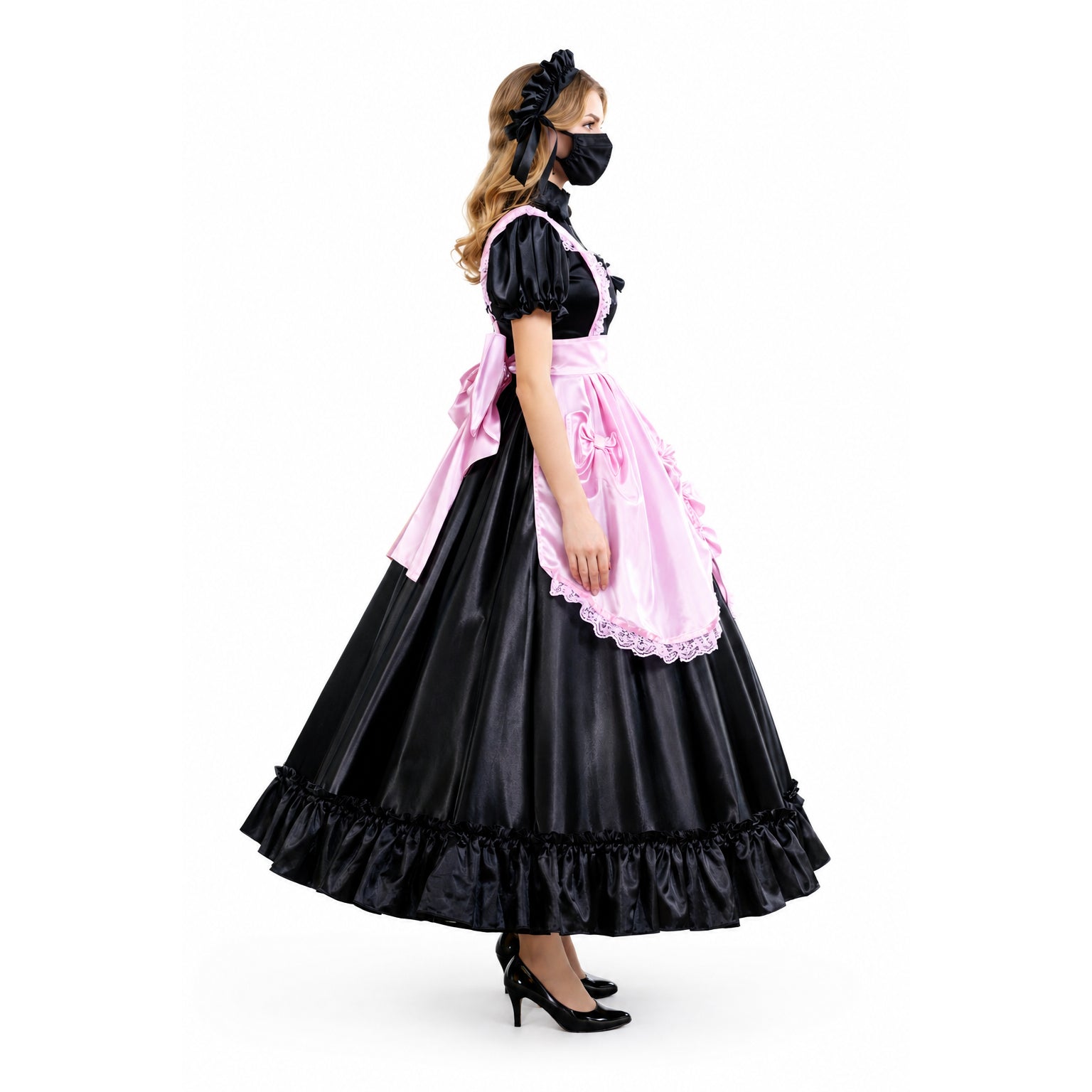 Black sissy maid dress with pink satin apron, lace trim, and ruffled hem, styled with matching headband and heels