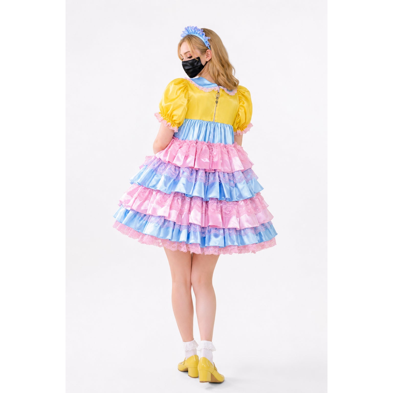 Pastel sissy maid dress with ruffled layers, yellow top, blue and pink skirt, lace trim, and matching headband