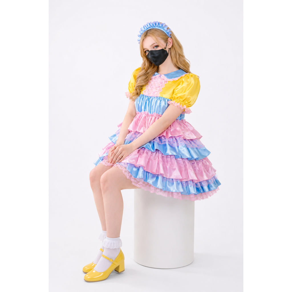 Pastel sissy maid dress with ruffles, lace, and puff sleeves, paired with yellow heels and headband