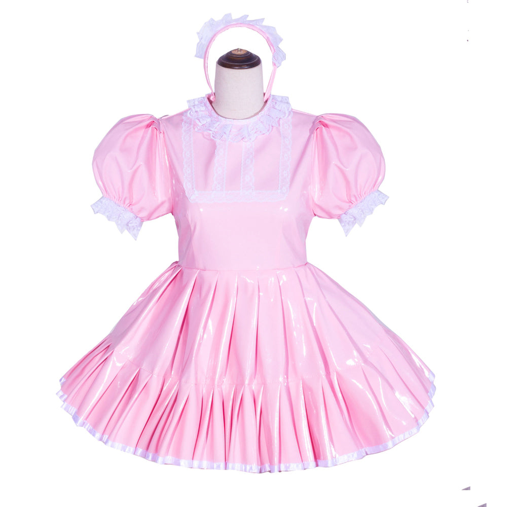 Pink sissy maid dress with lace trim, puffed sleeves, and pleated skirt on mannequin