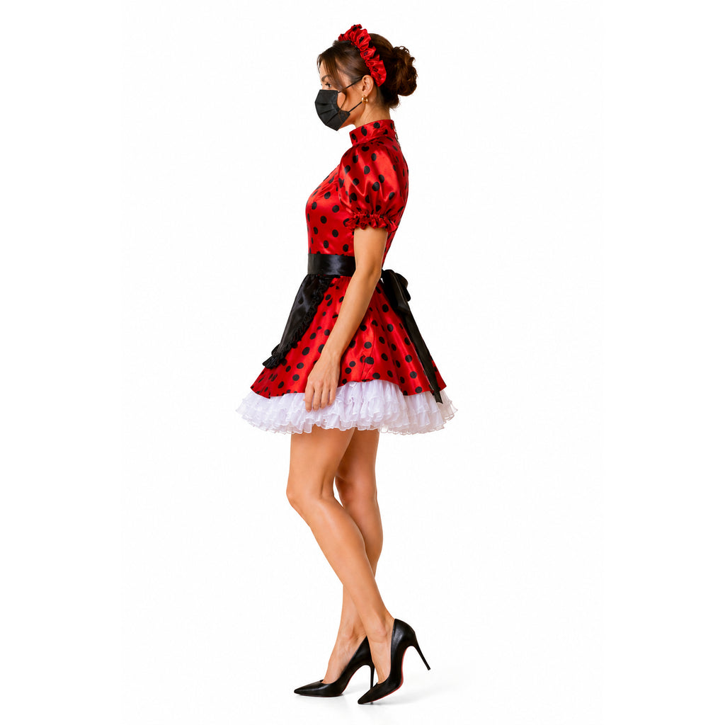Red polka dot sissy maid dress with black apron, white ruffles, and high heels