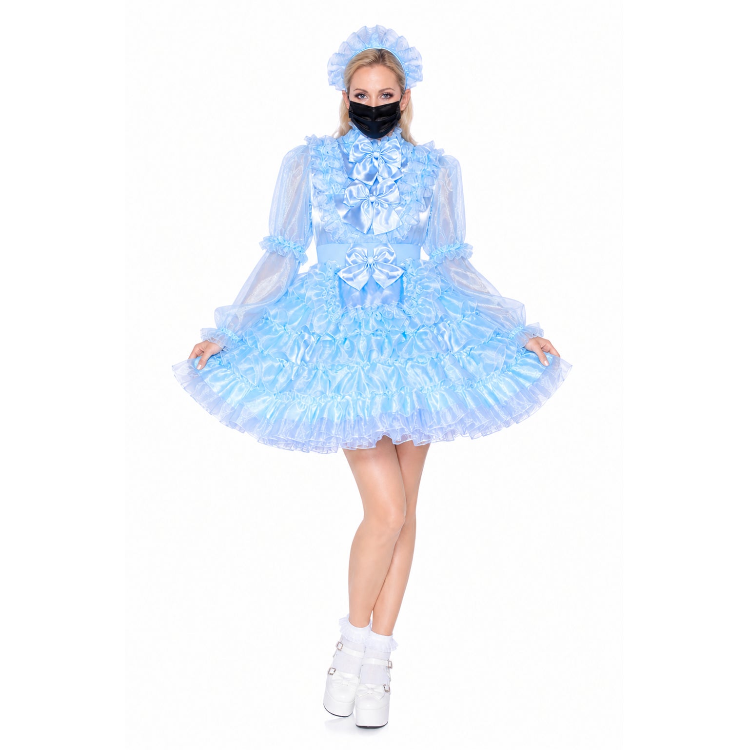 Light blue sissy maid dress with ruffles, bows, and matching hat, styled with white platform shoes.