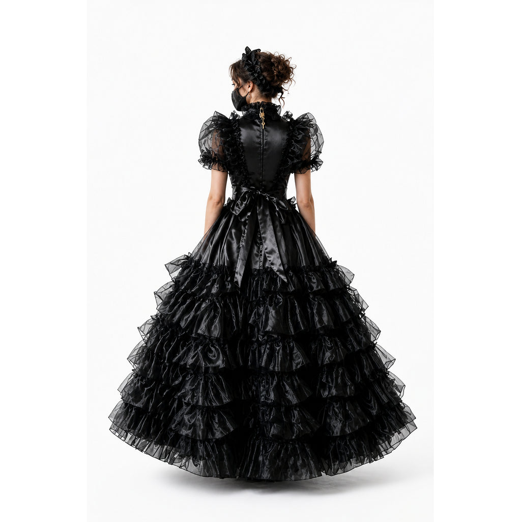 Black sissy maid dress with ruffled layers, satin bow, and sheer puff sleeves, back view
