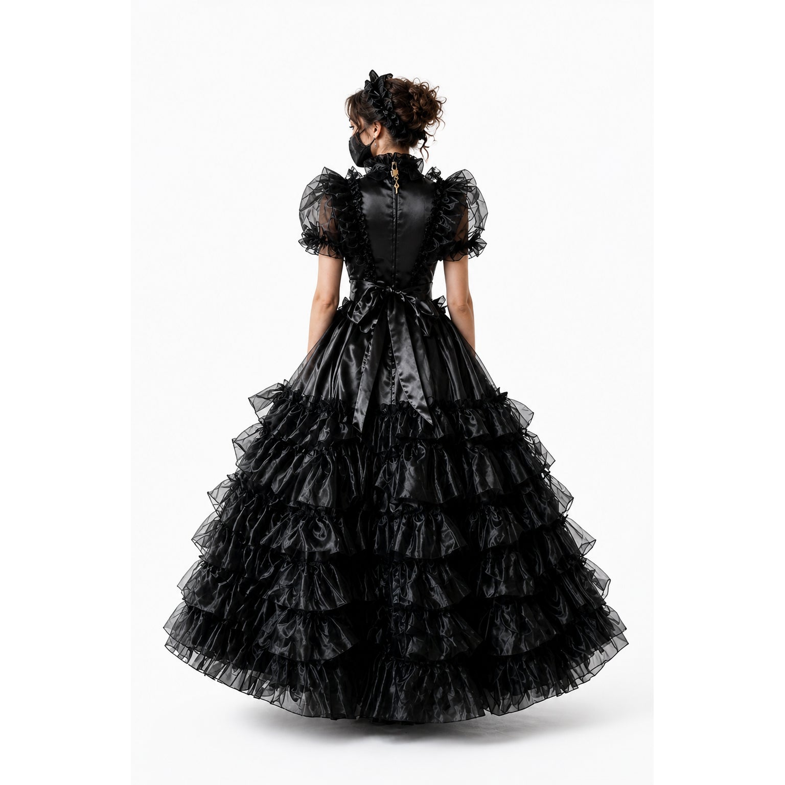 Black sissy maid dress with ruffled layers, satin bow, and sheer puff sleeves, back view