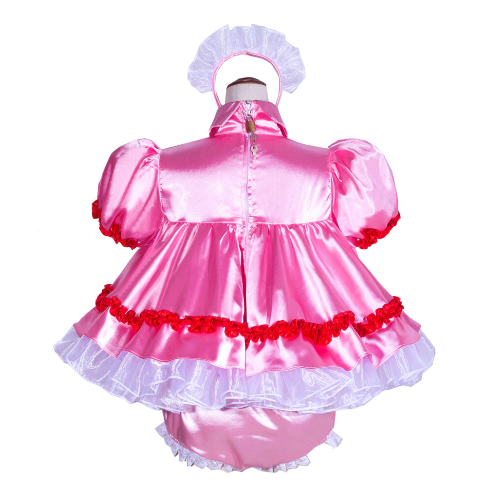 Pink satin sissy maid dress with red ruffles, white lace trim, and matching bonnet, back view
