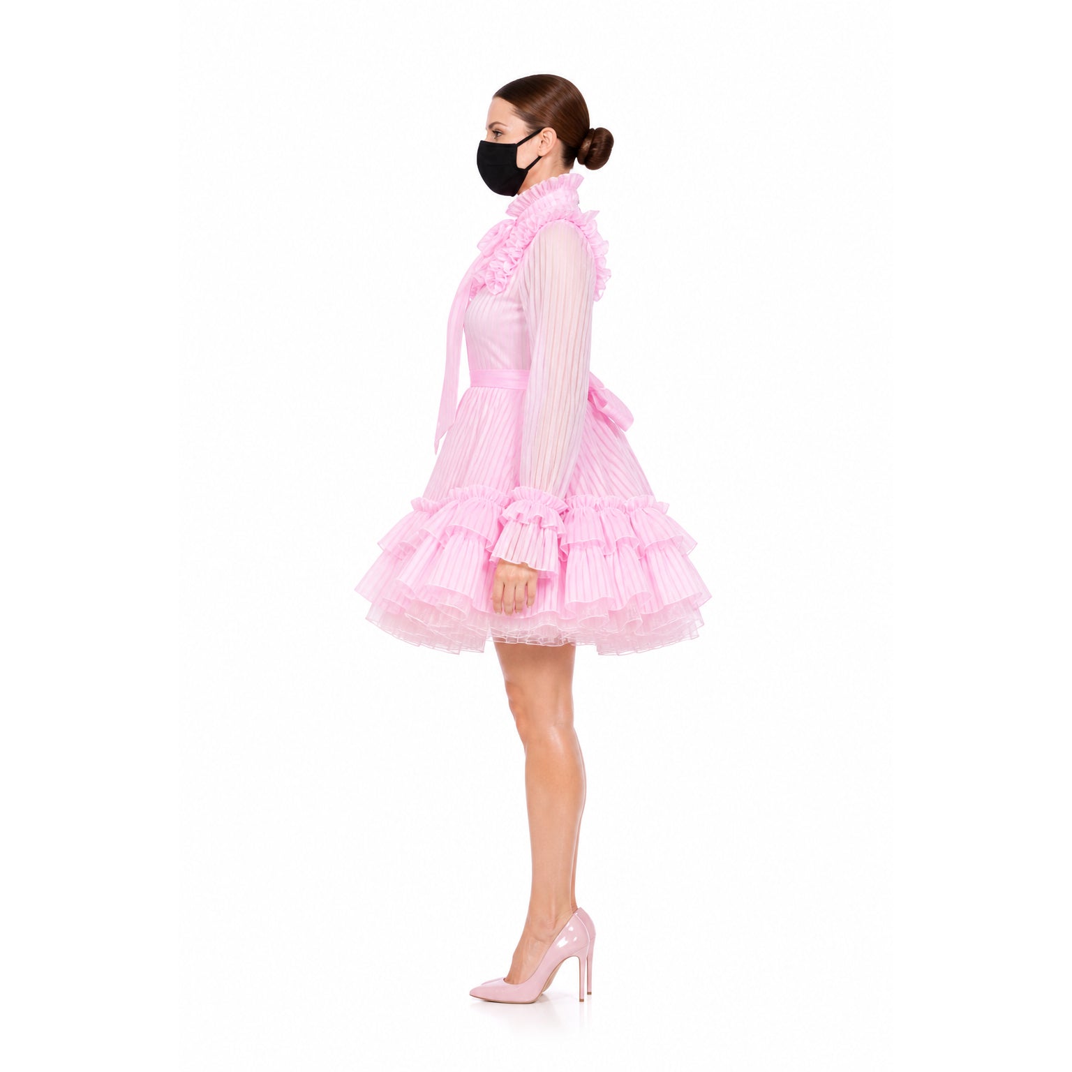 Pink sissy maid dress with ruffles, sheer sleeves, and pleated skirt, paired with matching heels