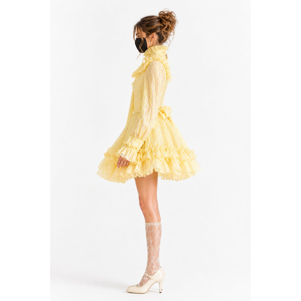 Yellow ruffled sissy maid dress with lace stockings and heels