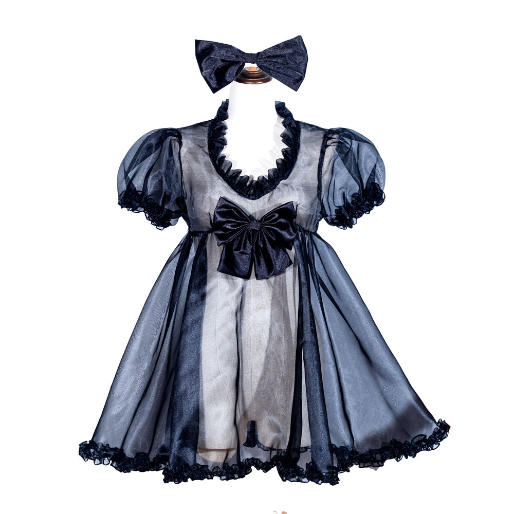 Black sissy maid dress with sheer overlay, ruffles, and bow accents, displayed on mannequin