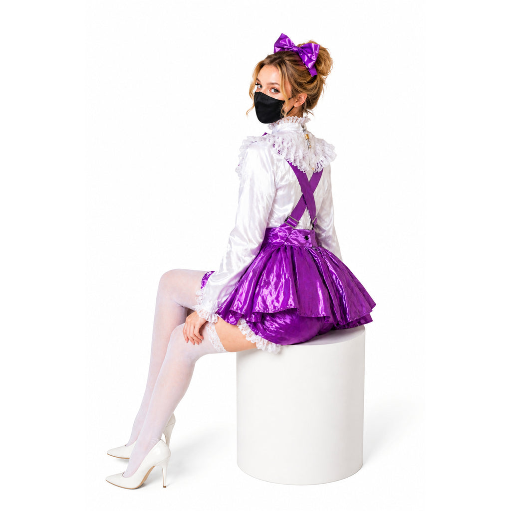 Purple sissy maid dress with white blouse, lace trim, and bow, paired with white heels and stockings