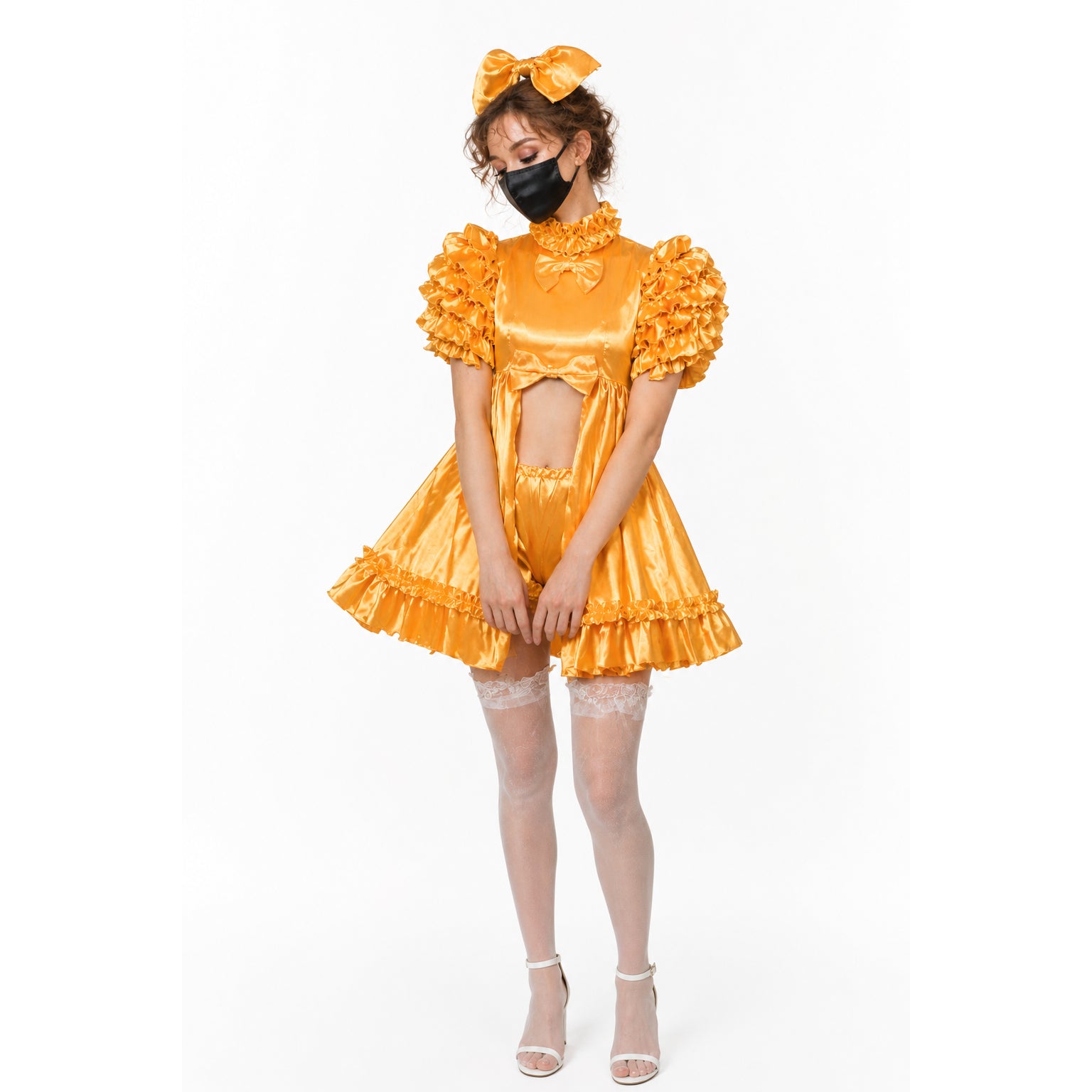 Golden sissy maid dress with ruffles, bow, and matching headpiece, styled with lace stockings and heels