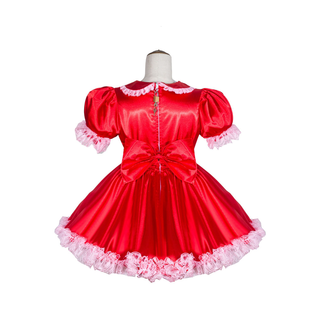 Red sissy maid dress with pink lace trim, puff sleeves, and back bow on mannequin