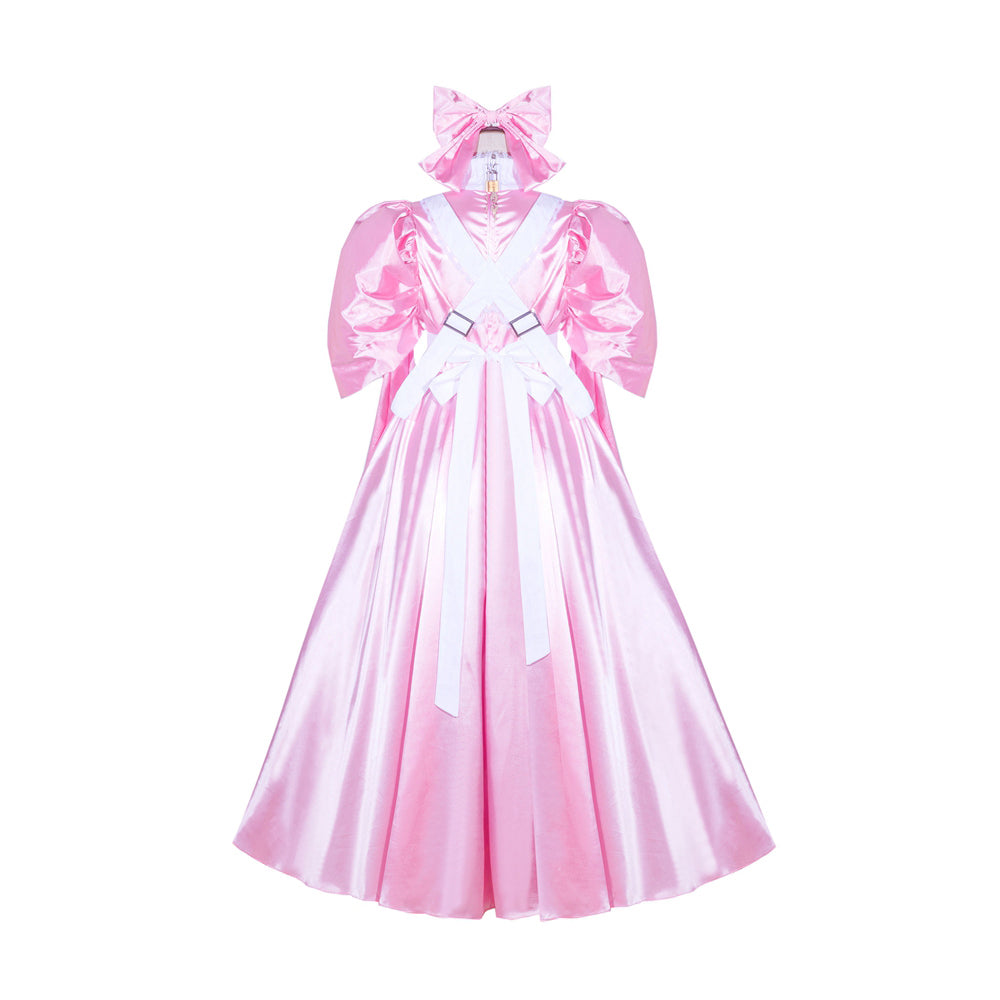 Pink sissy maid dress with white bow, puffy sleeves, and satin finish for costume fashion