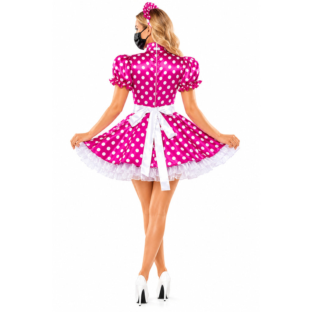 Pink polka dot sissy maid dress with white bow, ruffles, and high heels, back view