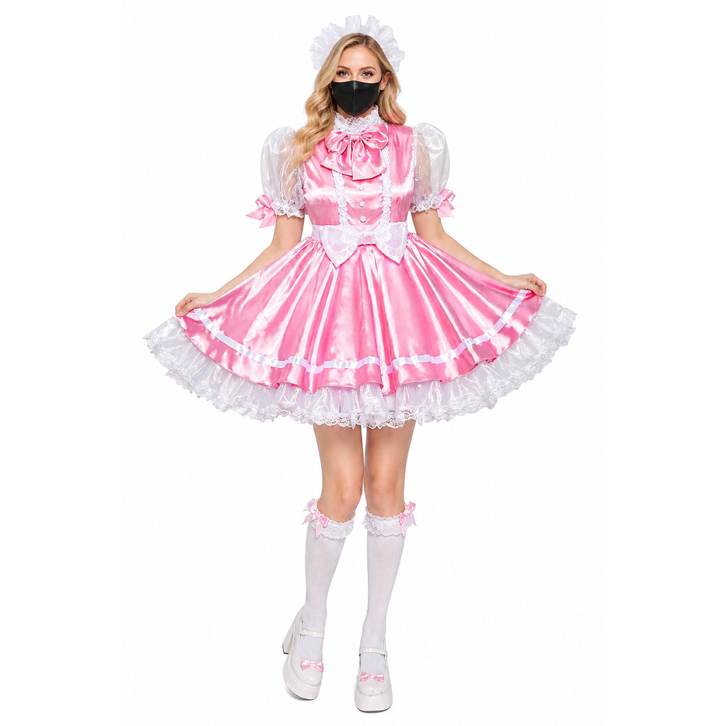 Pink sissy maid dress with white lace, puffy sleeves, and bow accents, paired with thigh-high stockings and platform shoes.