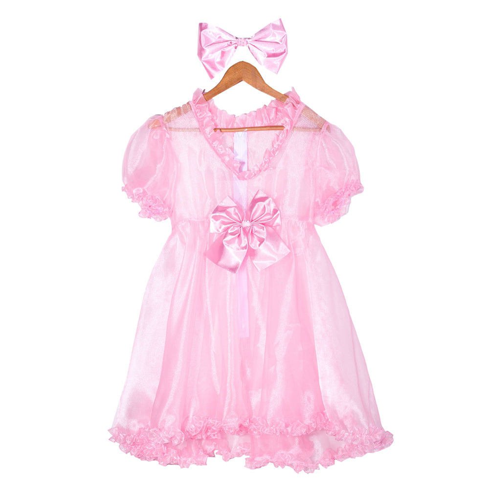 Pink sissy maid dress with ruffles, satin bow, and matching headband on hanger