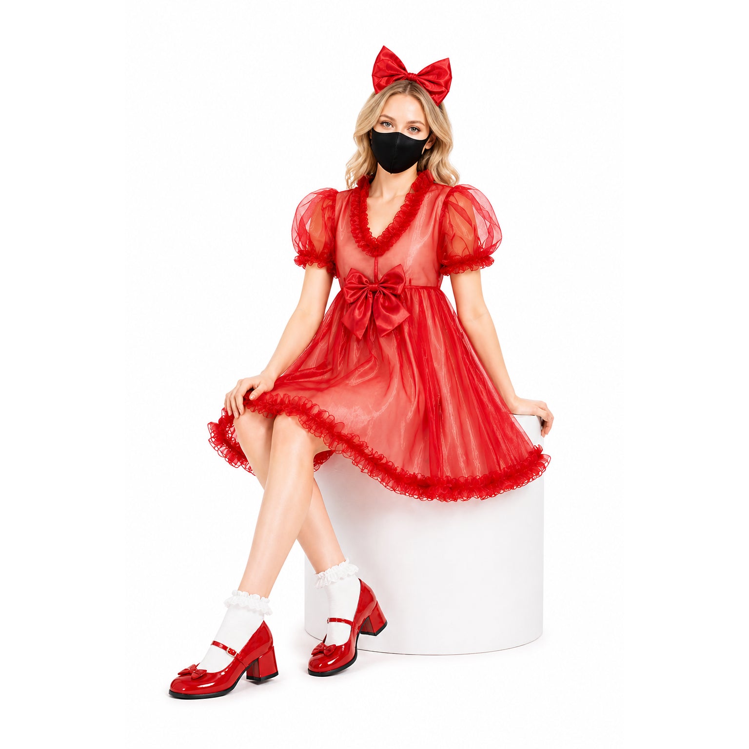 Red sissy maid dress with ruffles, bow, and matching headband, paired with white socks and red heels.