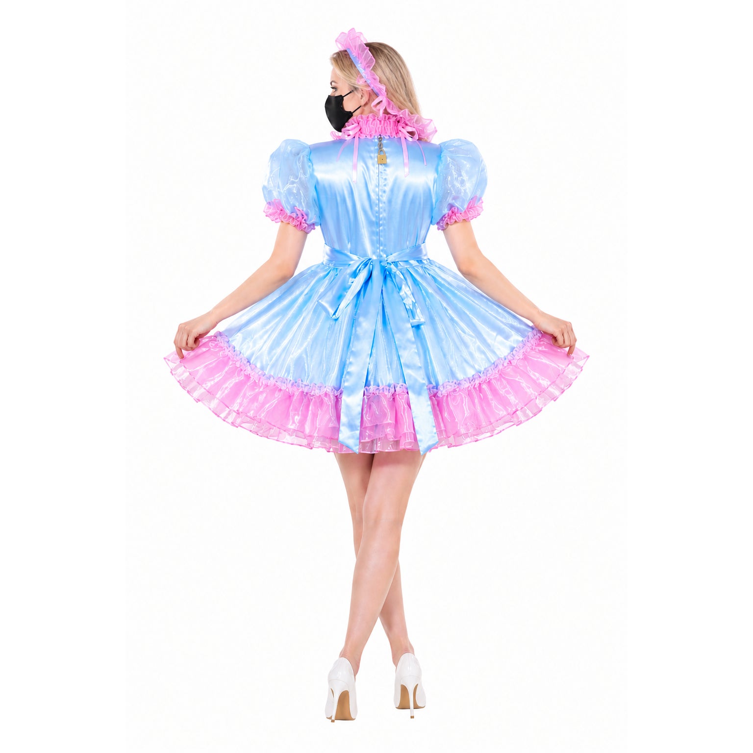 Blue and pink sissy maid dress with ruffles, bow, and lock detail, worn with white heels