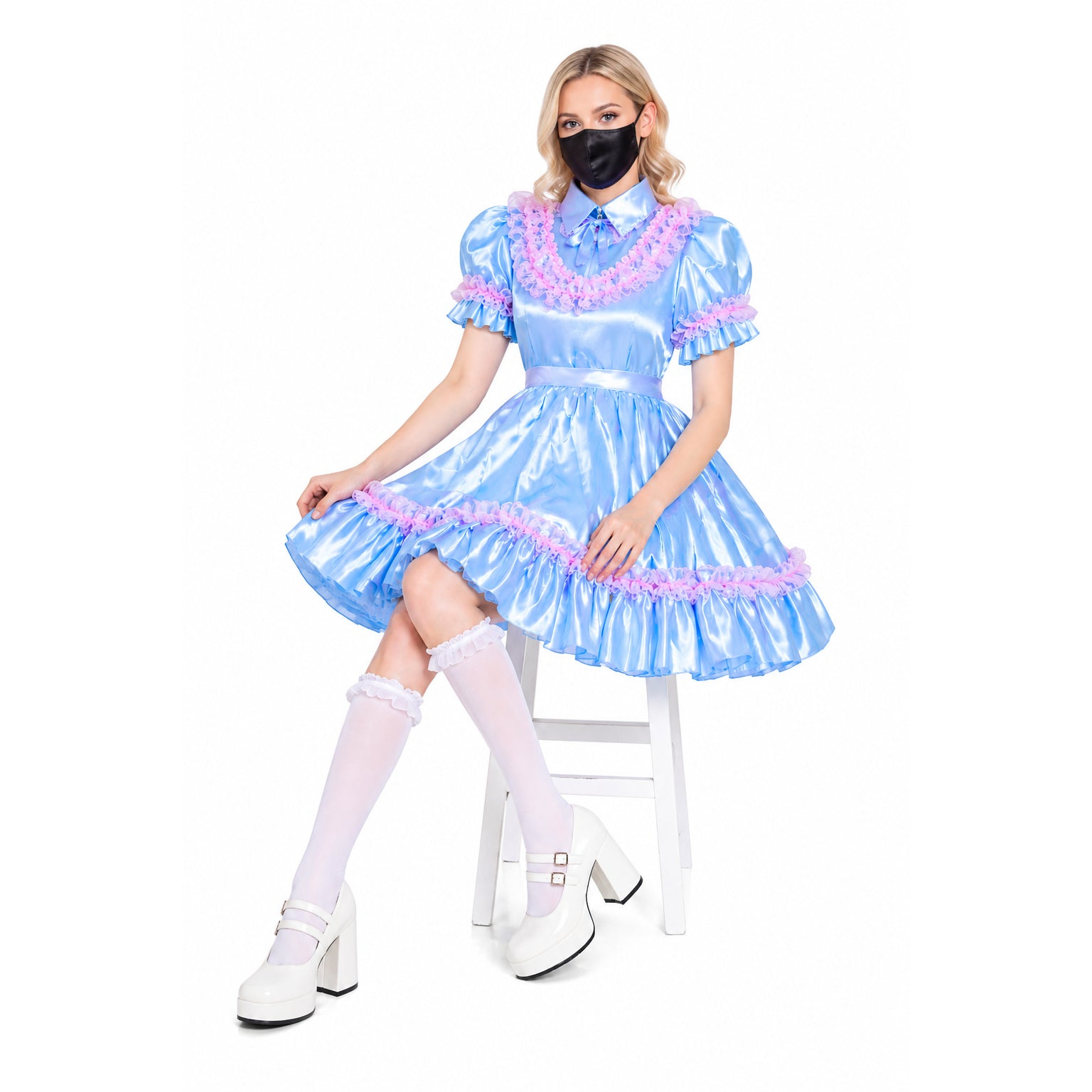 Blue sissy maid dress with pink ruffles, white stockings, and platform shoes
