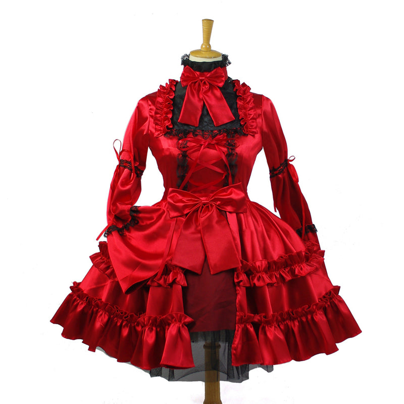Red sissy maid dress with black lace, ruffles, and bow accents on mannequin